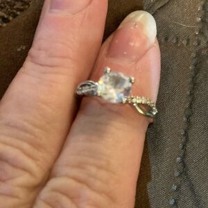 Gra 1 carat round brilliant Moissanite ring with adjustable band. Certified